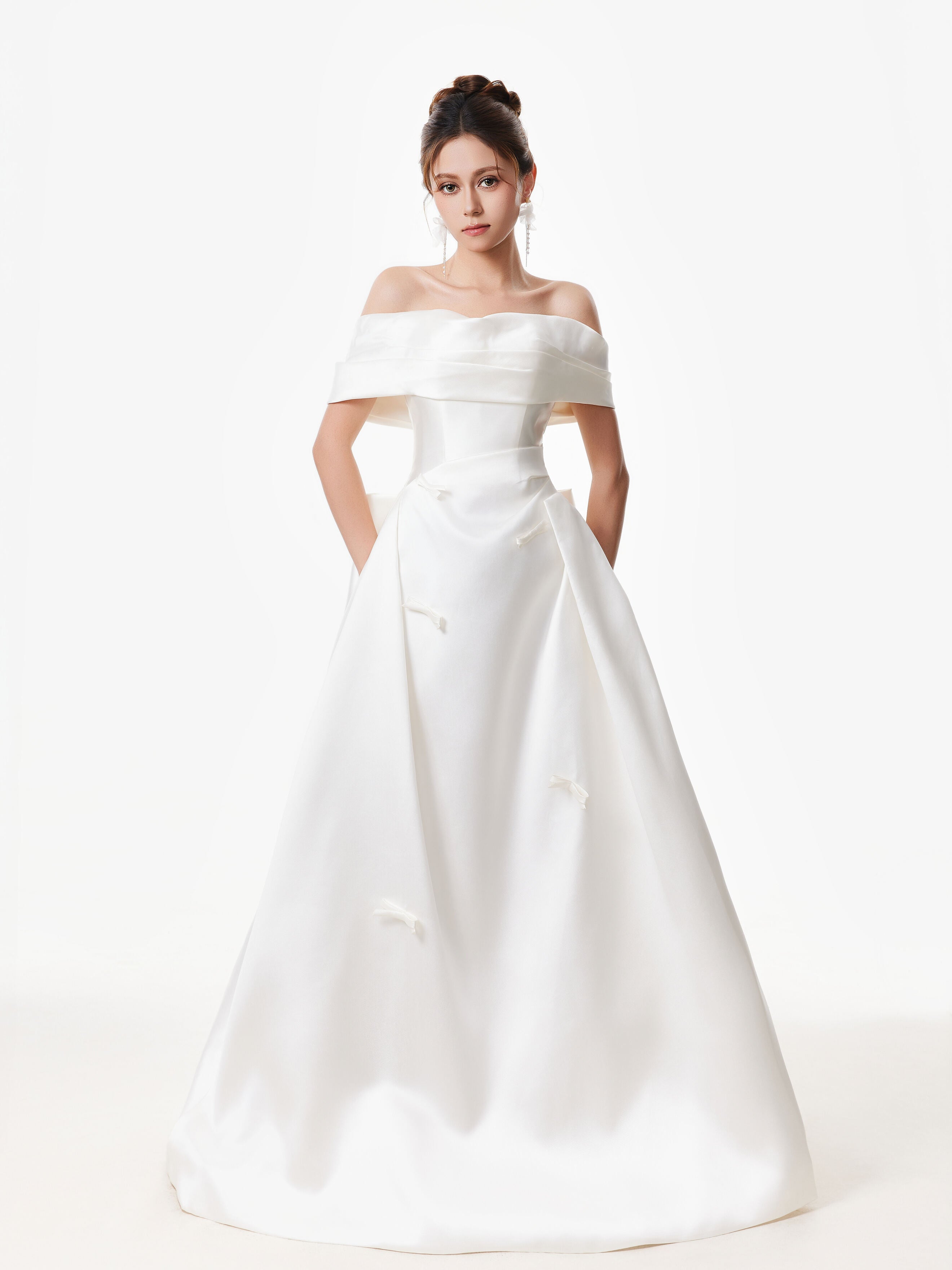 Off Shoulder Satin Gown with Draped Bodice and Bow Accents